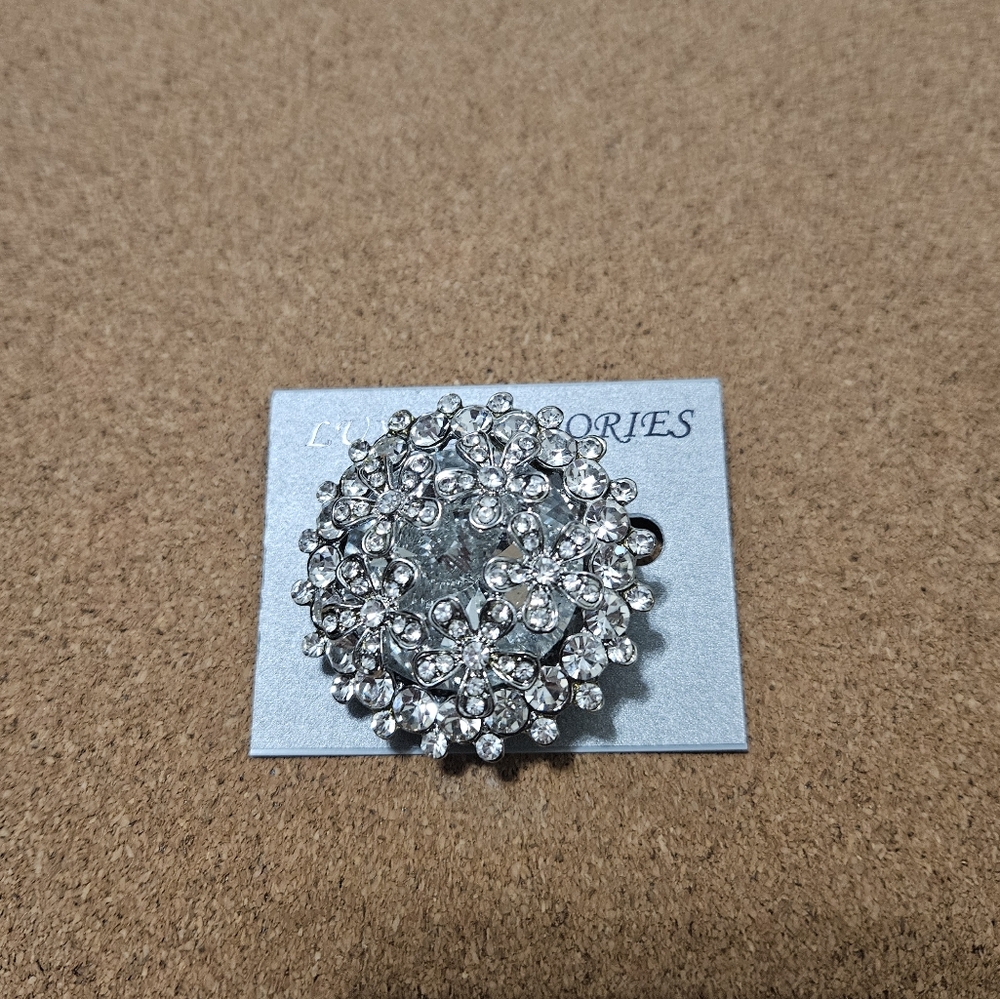 Silver rhinestone brooch